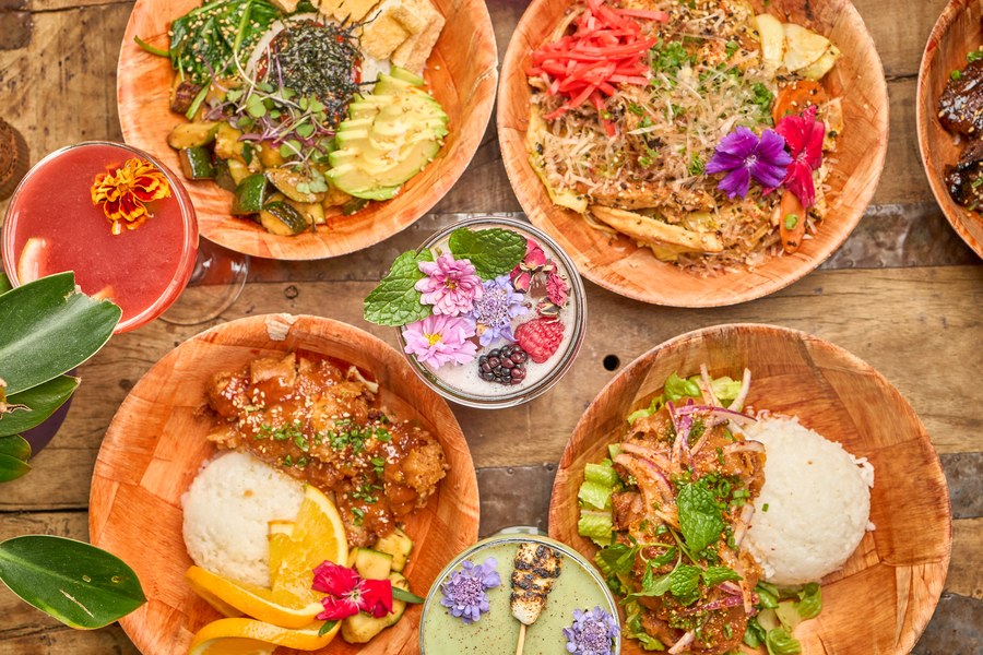An overhead spread of colorful Phat Cart dishes